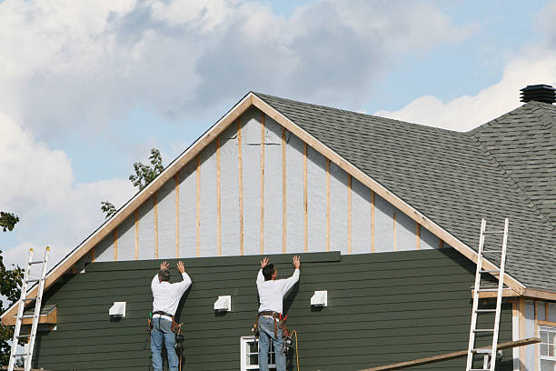 Professional Emergency Siding Repair technician working in Atlantic, PA